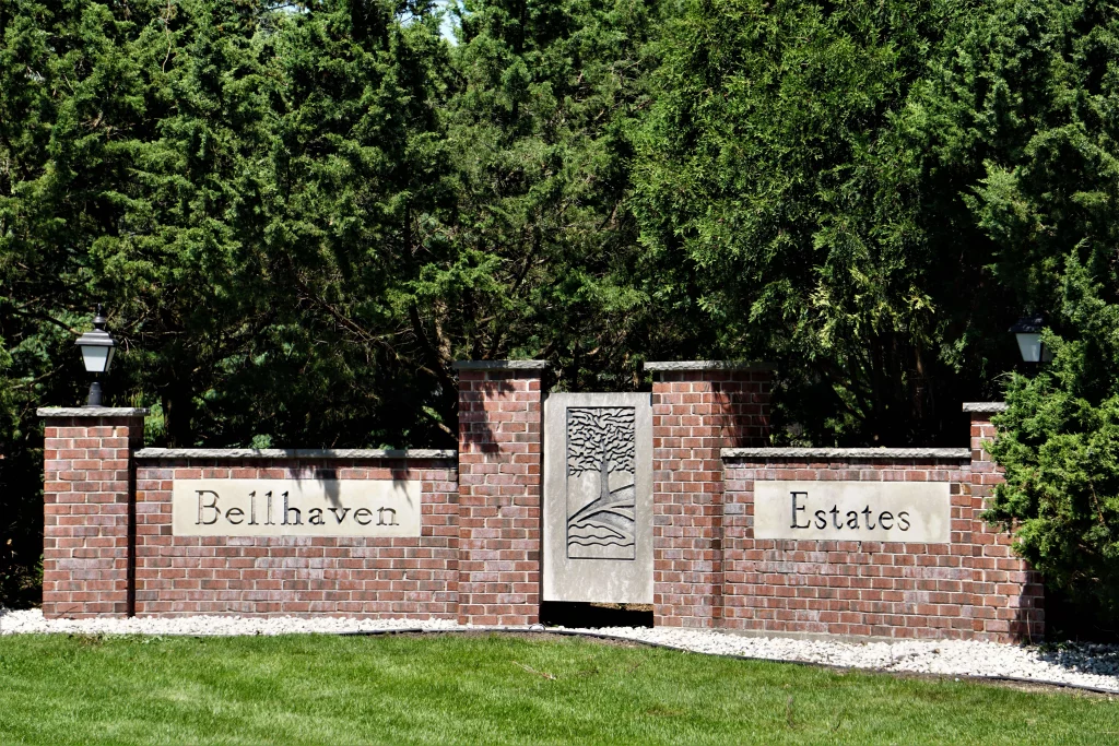Ballhaven Estates entrance sign surrounded by trees