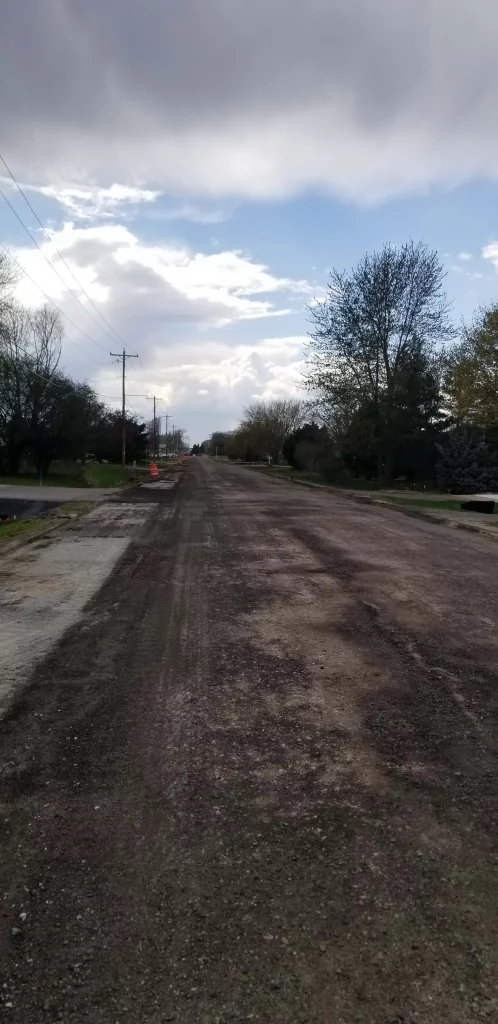 Long dirt road in residential area