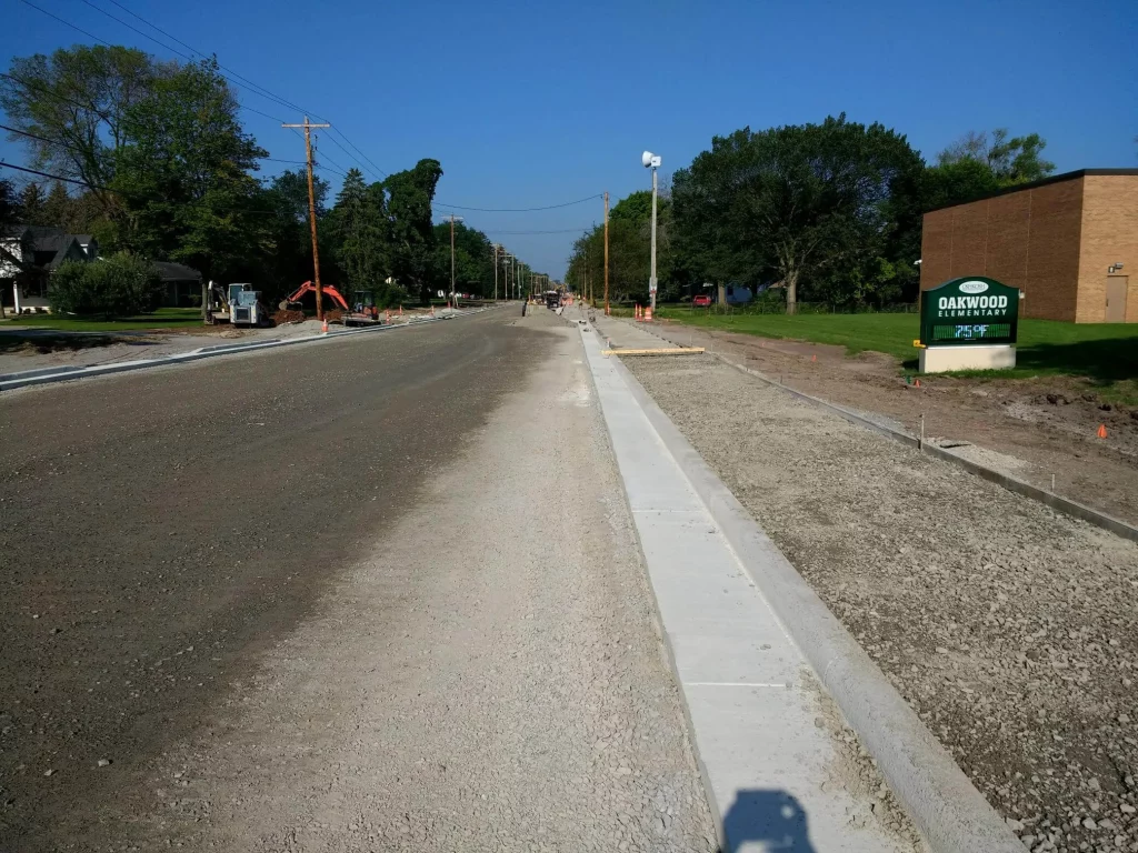 Road and sidewalk construction next to Oakwood Elementary